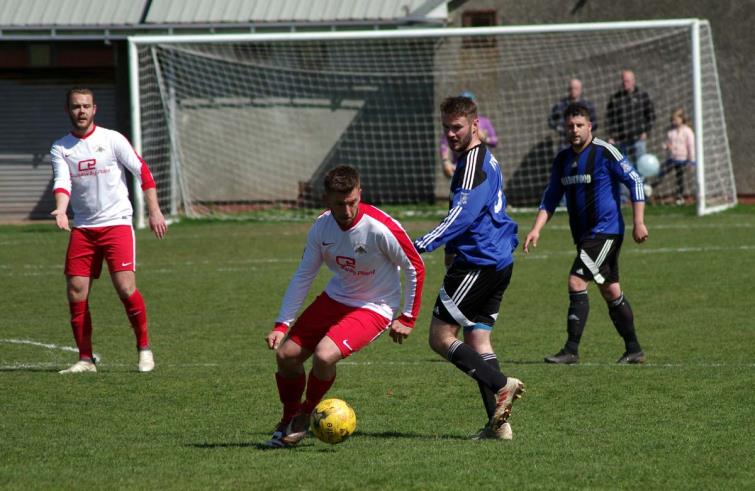 Action from the Obs where Merlins Bridge won 3-2 against Hakin United to secure the runners up spot in the First Division in the last game of the season